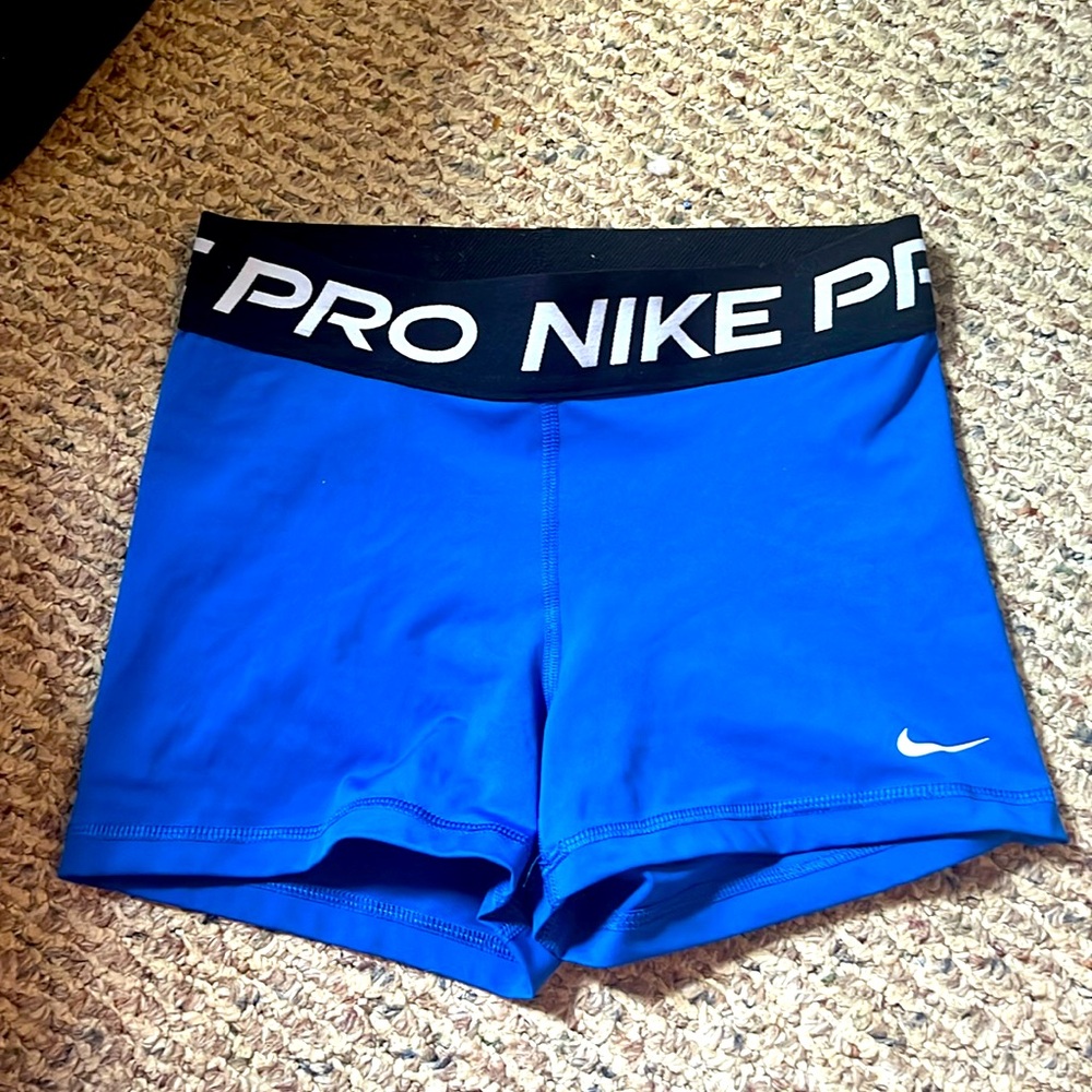 Bright blue Nike pro shorts